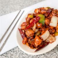 Kung Pao Chicken · Diced chicken sauteed with pepper, onion and peanuts in special plum sauce. Hot and spicy.