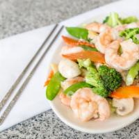 Tung Ting Shrimp · Shrimp with snow peas, bamboo shoots, mushrooms, baby corn, broccoli and water chestnuts in ...