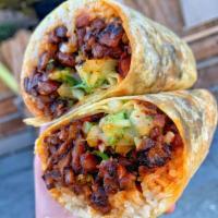 Regular Burrito · Meat, Whole Beans, Rice, Onion, Cilantro, & Salsa
