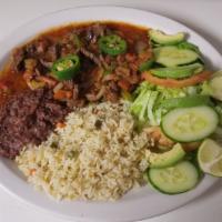 Bistec Mexicano · Thin cut steak simmered in a mildly spicy Mexican sauce served with rice, beans and salad