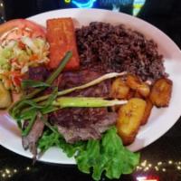 Churrasco Nica · Grilled steak, mixed rice & beans, fried plantains, cabbage salad, and fried cheese
