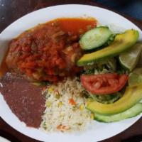 1 Chile Relleno de Carne · Beef Chile Relleno served w/ rice, beans and salad