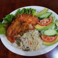 Relleno de Pacaya · Palm Flower Relleno served w/rice, beans and salad
