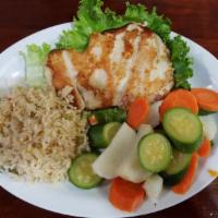 Pechuga a La Plancha · Grilled chicken breast served w/rice and vegetables