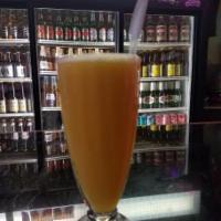Jugo de Naranja Natural Juice · Freshly squeeze OJ