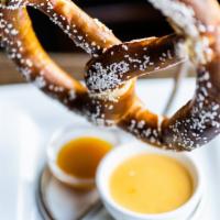 Little Pub Big Pretzel · jumbo soft pretzel, cheese sauce, honey mustard
