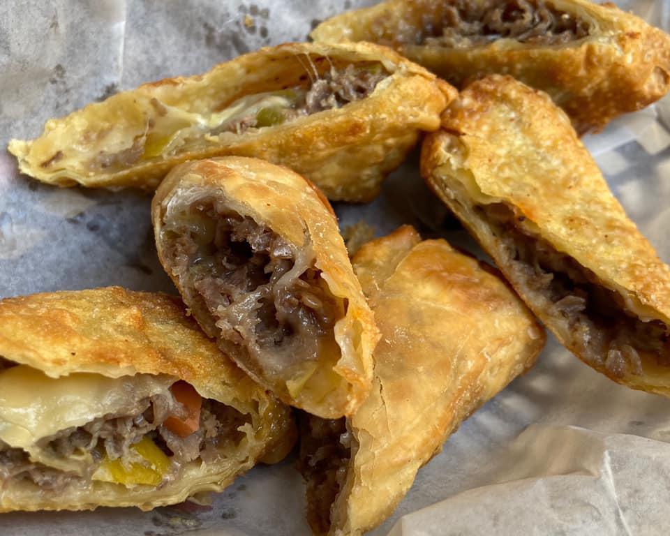 Italian Beef Rolls · Three hand-wrapped egg rolls, stuffed with savory Italian beef and giardiniera, served with our house made giardiniera aioli. From Oak Creek, Wisconsin.