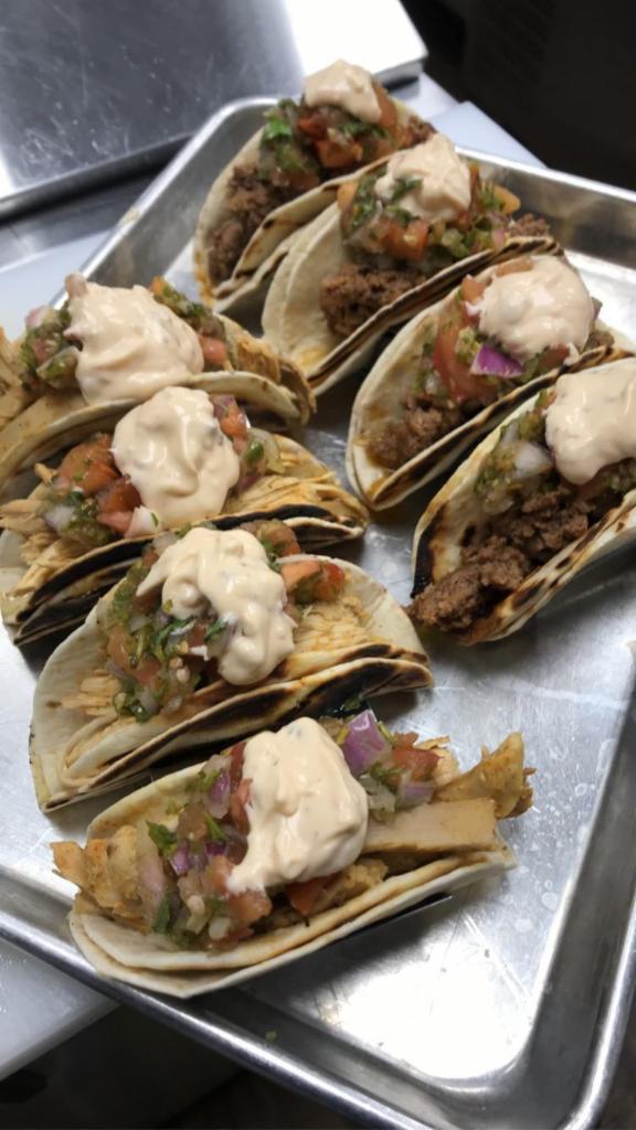 Street Tacos · Choose from our own beer-infused chicken, pork, ground beef or vegan, vegetarian option on corn tortillas with our house made pico de gallo and chipotle-lime aioli, served on corn tortillas. Vegetarian protein for an additional charge. Vegetarian and gluten free.