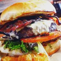 Rustic Burger · A generous portion of Angus beef, specially seasoned on a bun with organic harvest blend let...