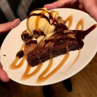 Caramel Brookie · The perfect blend of brownie and cookie, served with caramel and chocolate syrup. From MB’s ...