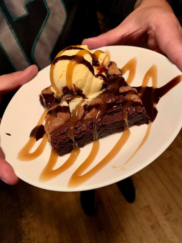 Caramel Brookie · The perfect blend of brownie and cookie, served with caramel and chocolate syrup. From MB’s Sweet Treats, Kenosha, Wisconsin.