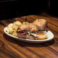 Hot Sicilian Sandwich · Ham, bacon, pepperoni, and Canadian bacon grilled and topped with melted mozzarella, banana ...