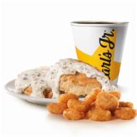 Biscuits N Gravy Combo · Buttermilk biscuit smothered in sausage gravy. Served with small drink and Hash Rounds®.
