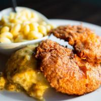 48-Hour Nashville Chicken · Fins' favorite. Marinated and hand-breaded in chef's secret blend of spices, mac and cheese,...