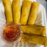 A1. Vegetable Spring Rolls · 6 pieces veggies spring rolls served with sweet chili sauce.