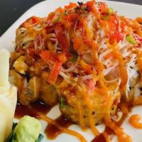 S14 Lava Roll · Shrimp tempura | cream cheese | cucumber | top w/ crab stick | yum yum sauce | eel sauce | s...