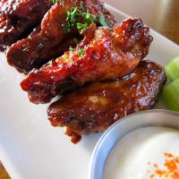Jumbo Wings · Marinated 24 hours, flash-fried to order, available flavors: Guinness BBQ, Buffalo, or jerk ...