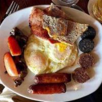 Irish Breakfast · 2 eggs, Irish sausages, rashers, black and white pudding, mushrooms, tomatoes, sourdough toa...
