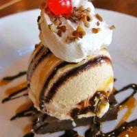 Brownie Sundae · Brownie topped with vanilla ice cream, whipped cream, pecans and chocolate sauce, big and go...