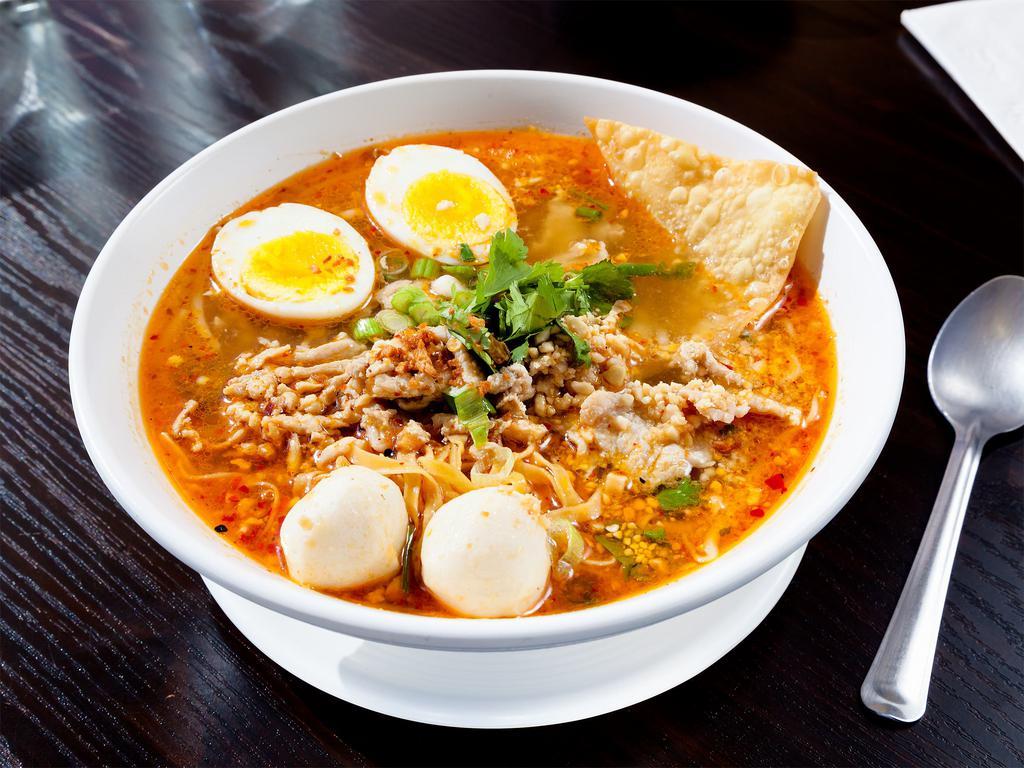 Tom Yum Noodle Soup · Choice of noodles with fish ball, minced pork, pork slices, soft boiled egg, fried wonton, bean sprouts, crushed peanuts, green onion and cilantro in spicy and sour soup.