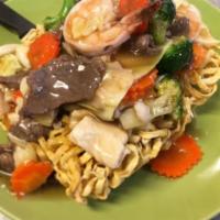 Mee Krob Rad Na · Crispy egg noodle topped with our special gravy sauce with broccoli, cabbage, carrot and you...