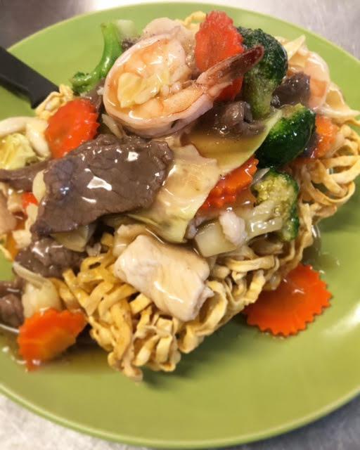 Mee Krob Rad Na · Crispy egg noodle topped with our special gravy sauce with broccoli, cabbage, carrot and your choice of meat.