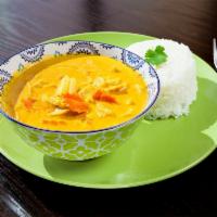 Yellow Curry with Rice · Your choice of meat with onion, carrot and potatoes in yellow curry sauce  served with steam...