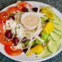 Greek Salad · Mixed greens, tomatoes, cocumber, onion, feta cheese, Mediterranean olives and pepperoncini.