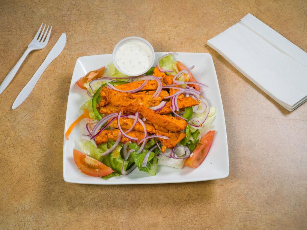 Tandoori Chicken Salad · Mixed greens, tomatoes, green pepper and onion topped with grilled chicken marinated in tandoori spices.