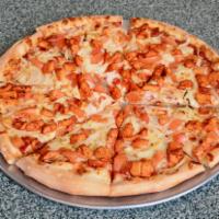 Tandoori Chicken Gourmet Pizza · Our tomato sauce, mozzarella and grilled chicken marinated in tandoori spices topped with to...