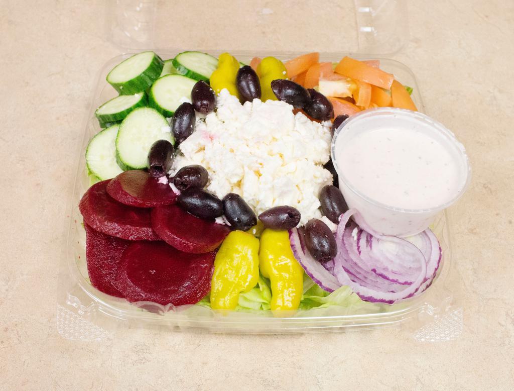 Greek Salad · Greek olives, beets, pepperoncini, feta and Greek dressing. Include romaine lettuce, cucumbers, tomatoes and red onions.