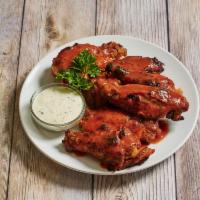 Hotties Famous Wings · Baked and seasoned to perfection. Served with a choice of dressing and our special spicy sau...