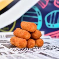 Croqueta · Our homemade croquetas: served in single, get as many as you'd like!