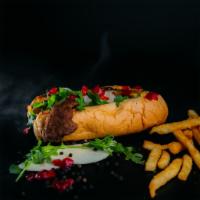 Philly Cheesesteak Combo · Sliced Beef, house-made cheese sauce, grilled onions, piquante peppers