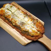 Margherita Flat Bread · Pesto, mozzarella, tomato, basil