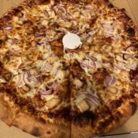 BBQ Chicken Pizza · Sliced chicken breast, red onions, cilantro, BBQ sauce, and extra mozzarella cheese.
 