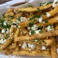 Garlic and Feta Fries  · Fries seasoned with garlic and topped with Feta Cheese 