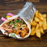 Chicken Shawarma Combo · Wrapped with lettuce, wrapped and drizzled with our homemade sauce. Includes fries and soft ...
