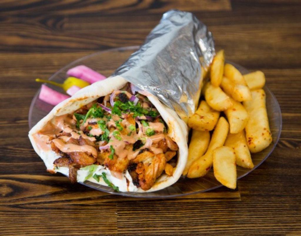 Chicken Shawarma Combo · Wrapped with lettuce, wrapped and drizzled with our homemade sauce. Includes fries and soft drink.