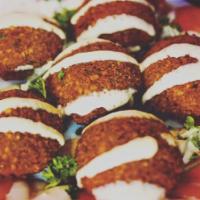 Falafel · 5 homemade deep fried ball made with fresh chickpeas and spices served with your choice of h...