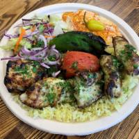 Chicken Kabob (BEST SELLER) · Served with rice, hummus, salad, onions, grilled tomato, grilled jalapeno and pita bread.