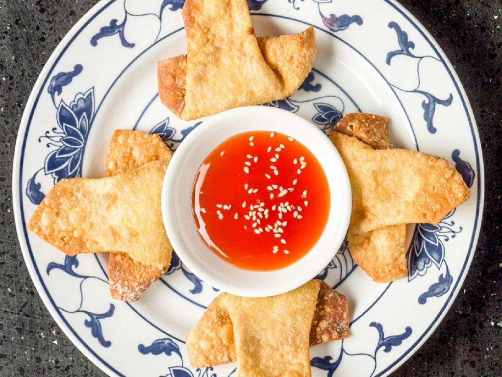 Crab Meat Rangoon (4) · 蟹角 4 Crab meat and cream cheese Rangoons served with sweet and sour sauce