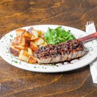 Bistecca di Manzo al Balsamico · Grilled all-natural 8oz. striploin with balsamic reduction and caramelized onions served wit...