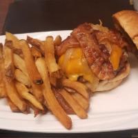 Big Dogggg Burger · Bacon, cheddar, sauteed onions, Barbecue sauce.