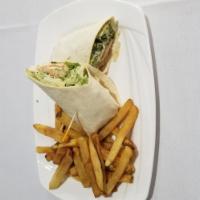 Grilled Chicken Caesar Wrap · A rolled filled tortilla or flatbread. 