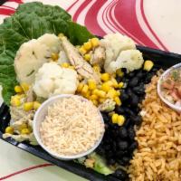 Vegan Cauliflower Champ Plate · Vegan chicken, cauliflower, corn, vegan cheese, brown rice and black beans. Vegan.