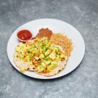 Southwest Rancheros Plate · Tofu turmeric scramble with chopped tomato, onions, peppers served with brown rice, pinto ma...