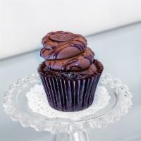 Chocolate Lovers Cupcake · Dark devil cake topped with a chocolate bu hittercream icing.