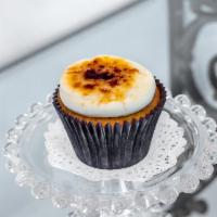 Creme Brulee Cupcake · Vanilla bean cake filled and topped with homemade creme custard and topped with caramelized ...