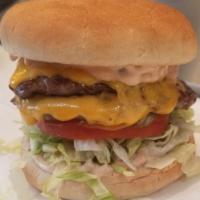 Double Burger w/Cheese · (2) 3 oz  Patties topped with Cheddar Cheese and comes with Lettuce, Tomato and Sloppy Sauce...